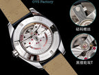 Stainless steel wristwatch with tan leather strap, white dial, and exposed movement details