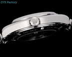 Stainless steel wristwatch crown and case profile with dark gasket detail