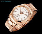 Rose gold wristwatch with white dial, metal link bracelet, and three sub-dial markers