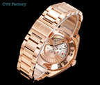 Rose gold wristwatch with see-through caseback showing mechanical movement and metal link bracelet