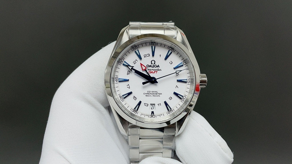 Omega watch with silver metal bracelet and white dial, blue hands and markers