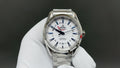 Omega watch with silver metal bracelet and white dial, blue hands and markers