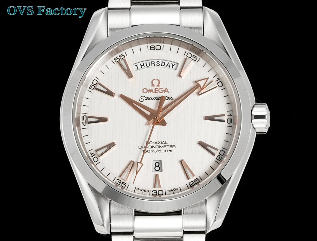 Stainless steel wristwatch with white dial, day/date window, and metal link bracelet.