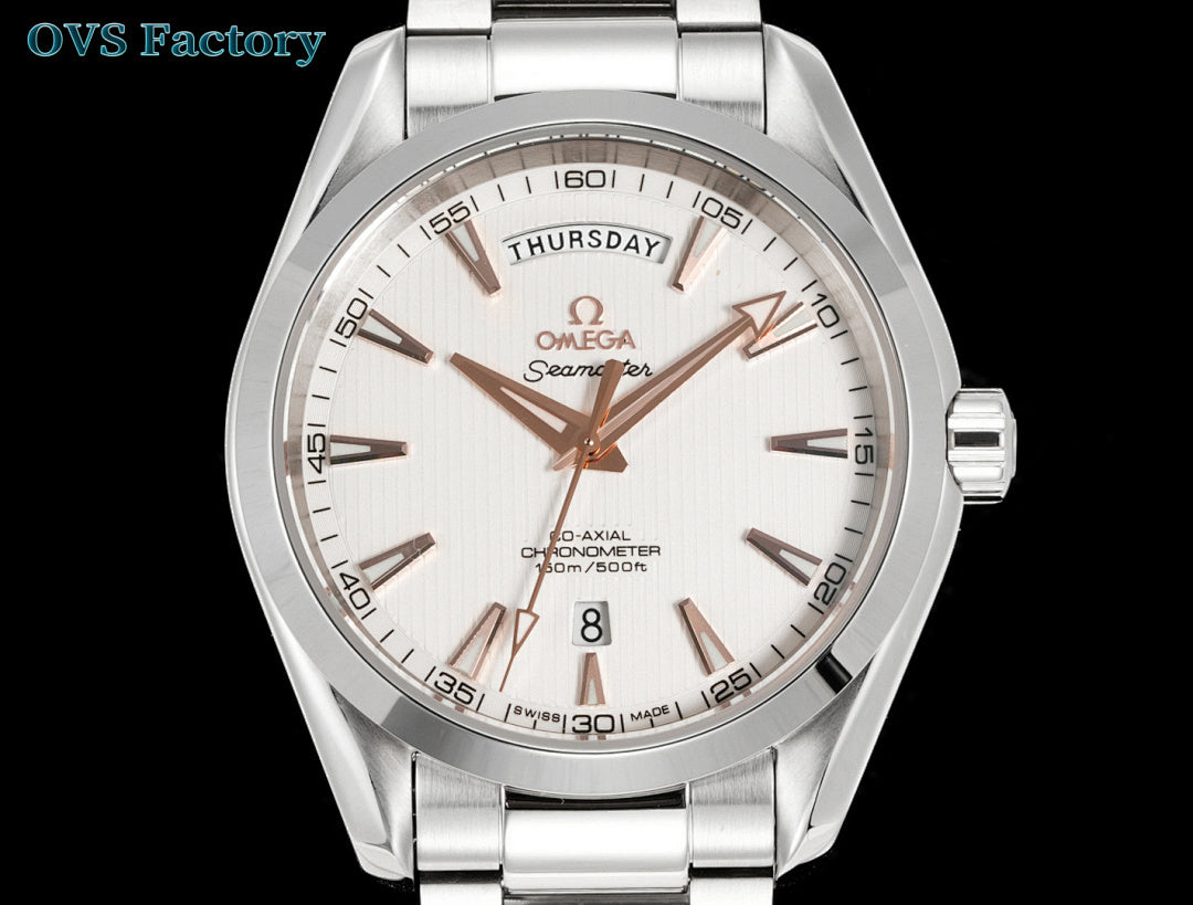 Stainless steel wristwatch with white dial, day/date window, and metal link bracelet.