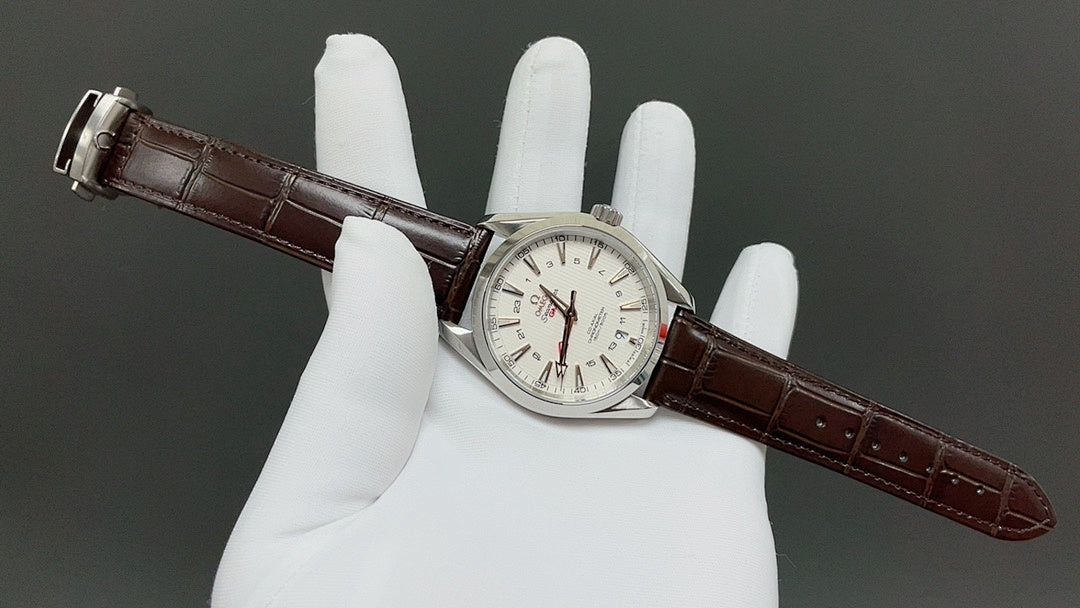 Omega watch with white dial and brown leather strap