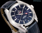 Omega wristwatch angled view, navy dial, silver case, dark blue leather strap.
