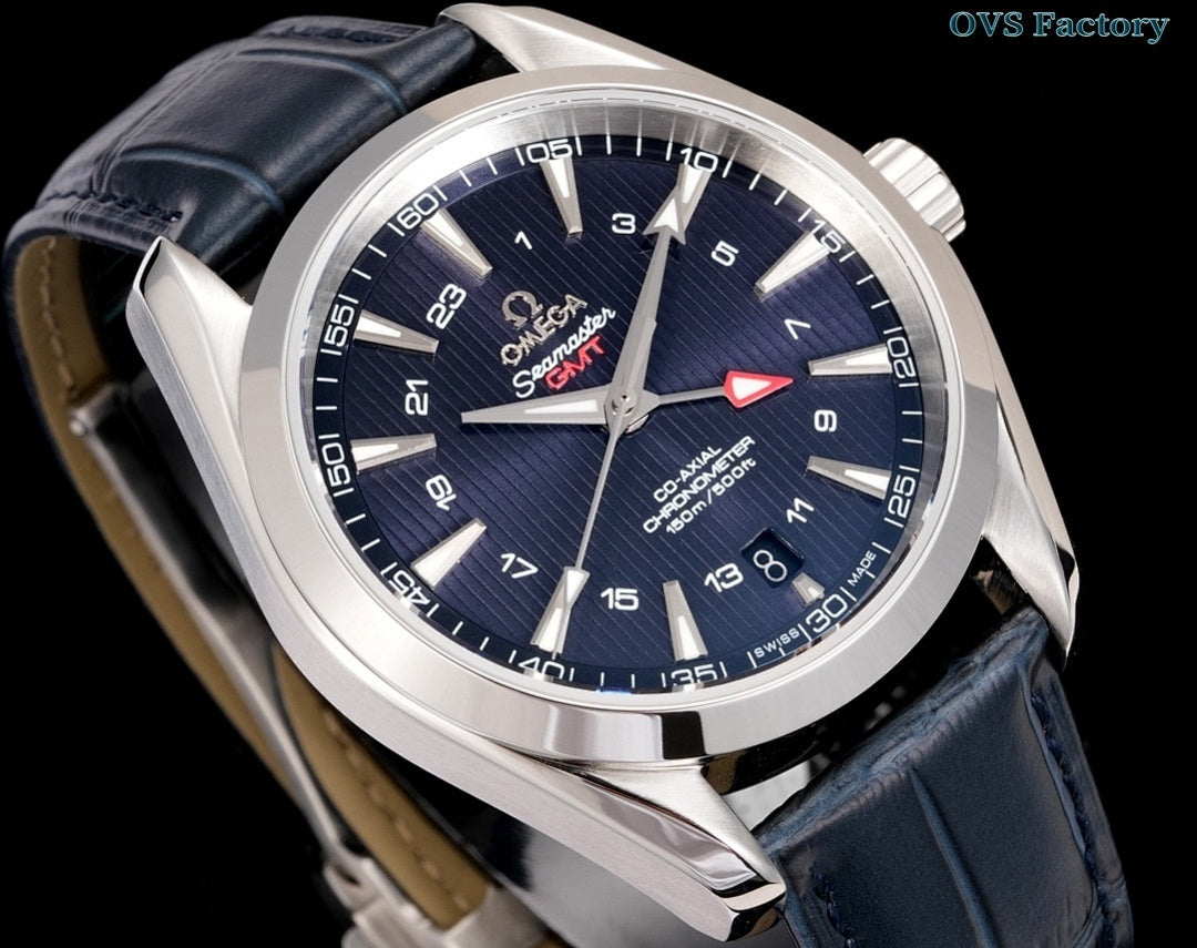 Omega wristwatch angled view, navy dial, silver case, dark blue leather strap.