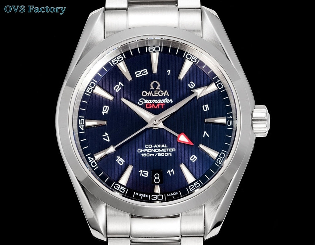 Analog wristwatch with stainless steel bracelet, blue dial, and red-triangle seconds hand.
