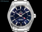 Analog wristwatch with stainless steel bracelet, blue dial, and red-triangle seconds hand.
