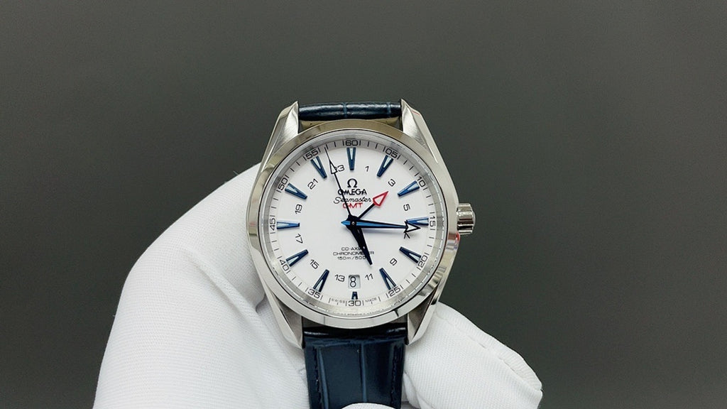 Wristwatch with white dial, blue leather strap, silver case and baton hour markers