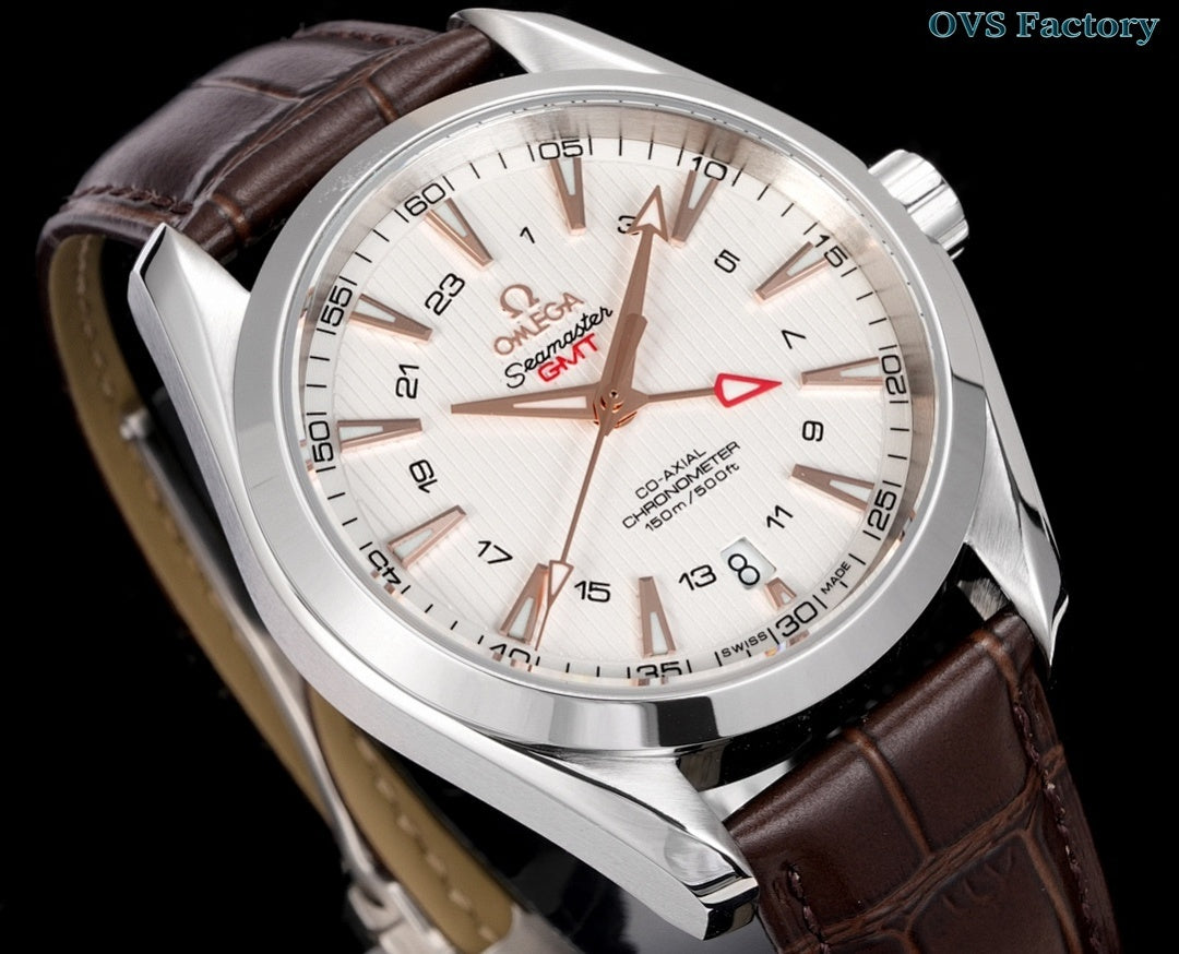 Omega Seamaster watch angled front, white dial with bronze-tone hands, brown leather strap.
