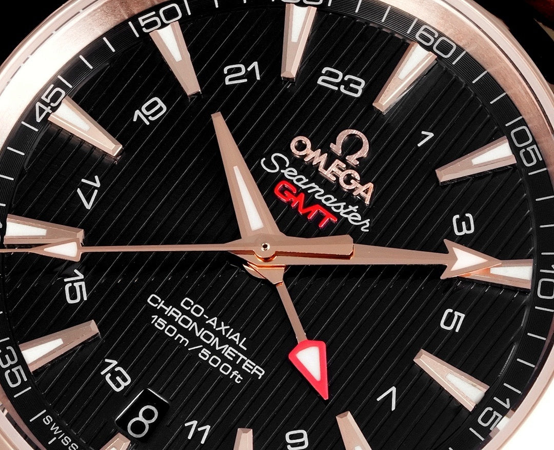 Omega watch dial close-up with black background, rose gold indices, and hands