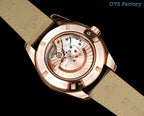 Wristwatch open caseback with visible mechanical movement and brown leather strap.