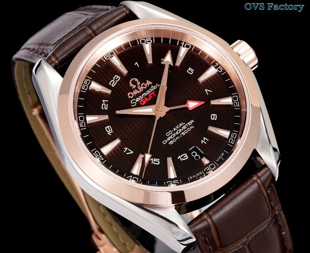 Round wristwatch with brown leather strap, rose-gold bezel, dark dial