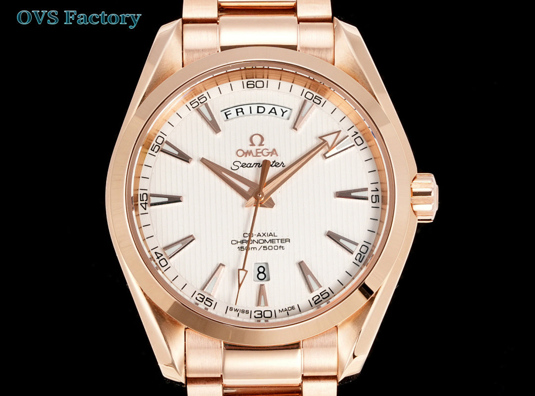 Rose-gold tone wristwatch with white dial, gold markers, and day-date window
