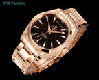 Rose-gold tone wristwatch with black dial and gold markers in angled view