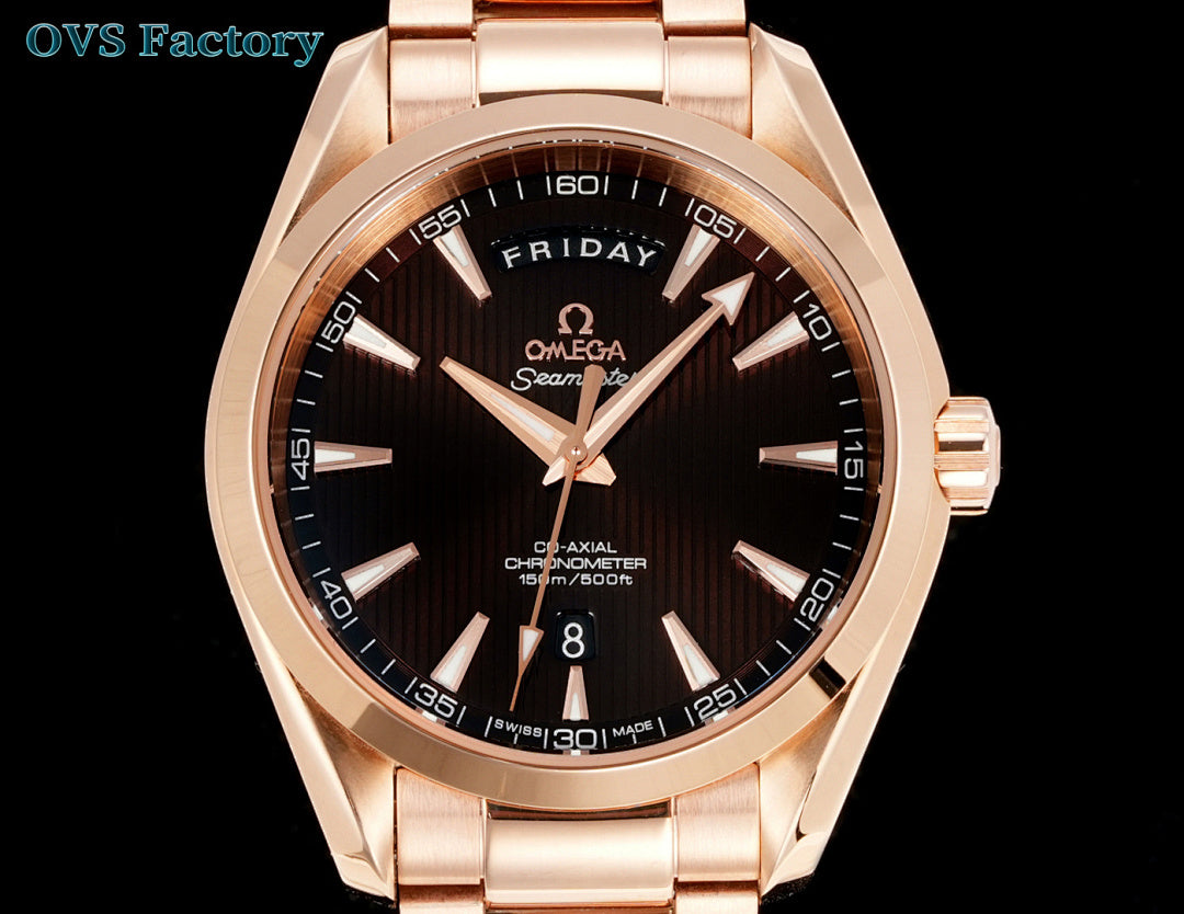 Rose-gold tone wristwatch with black dial, gold markers, and day-date window