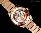 Rose-gold tone wristwatch with bracelet, angled view of clear caseback movement