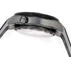 Omega watch close-up of the bezel and crystal over the case with black dial area