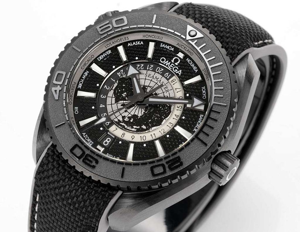 Omega watch angled view with black bezel, textured strap, and chronograph dial