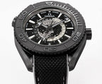Omega watch front view with black dial, bezel minute marks, and textured black strap