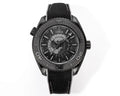 Omega watch with black dial, black fabric strap, and textured bezel detail