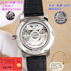 Stainless steel watch caseback on black leather strap, visible mechanical movement