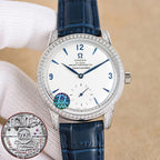 Silver analog wristwatch with diamond bezel, white dial, blue leather strap close-up