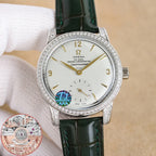 Silver analog wristwatch with diamond bezel, white dial, green leather strap