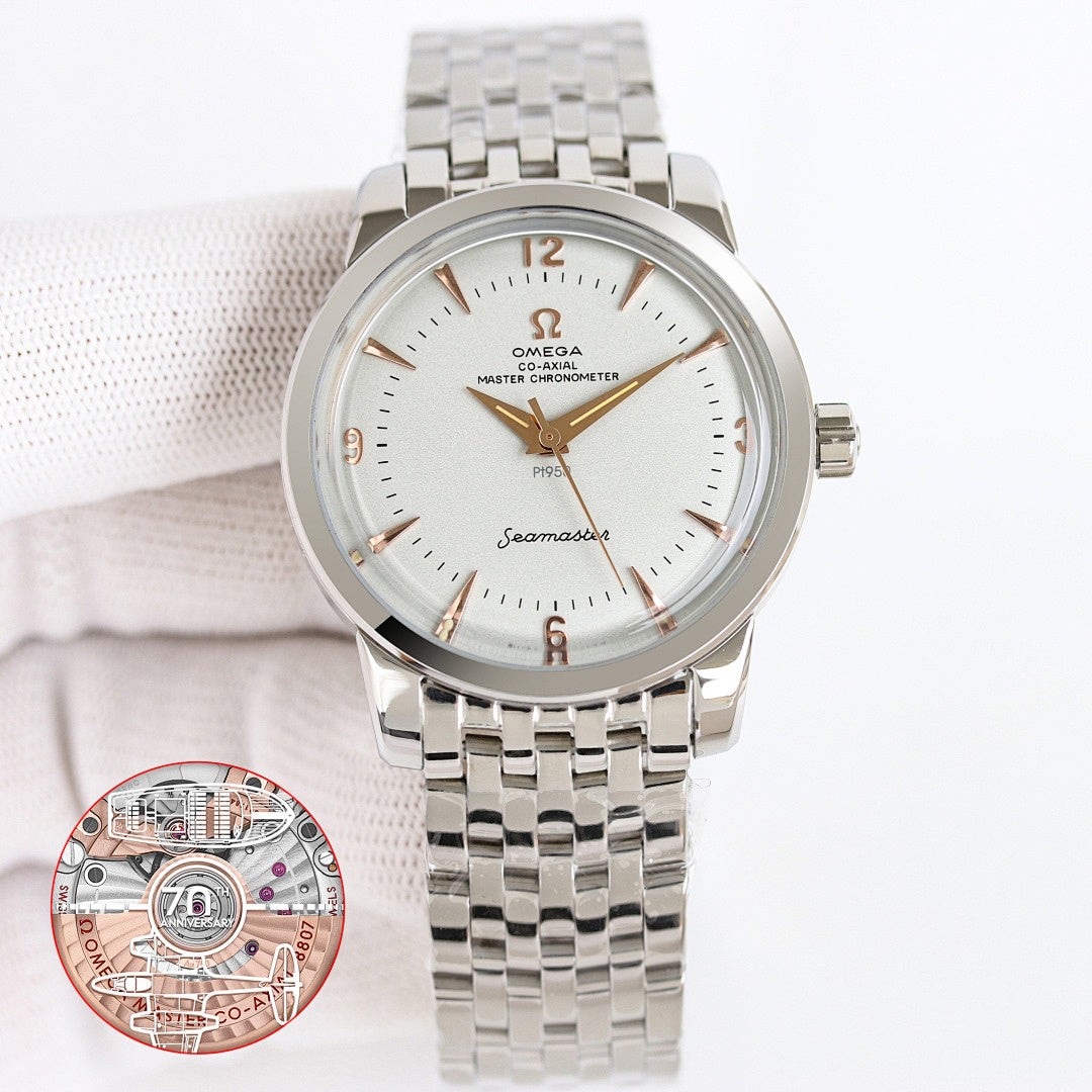 Seamaster wristwatch with silver metal bracelet and white dial, blue hands and markers