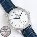 Silver-tone watch with blue leather strap, diamond bezel, white dial and blue hands.
