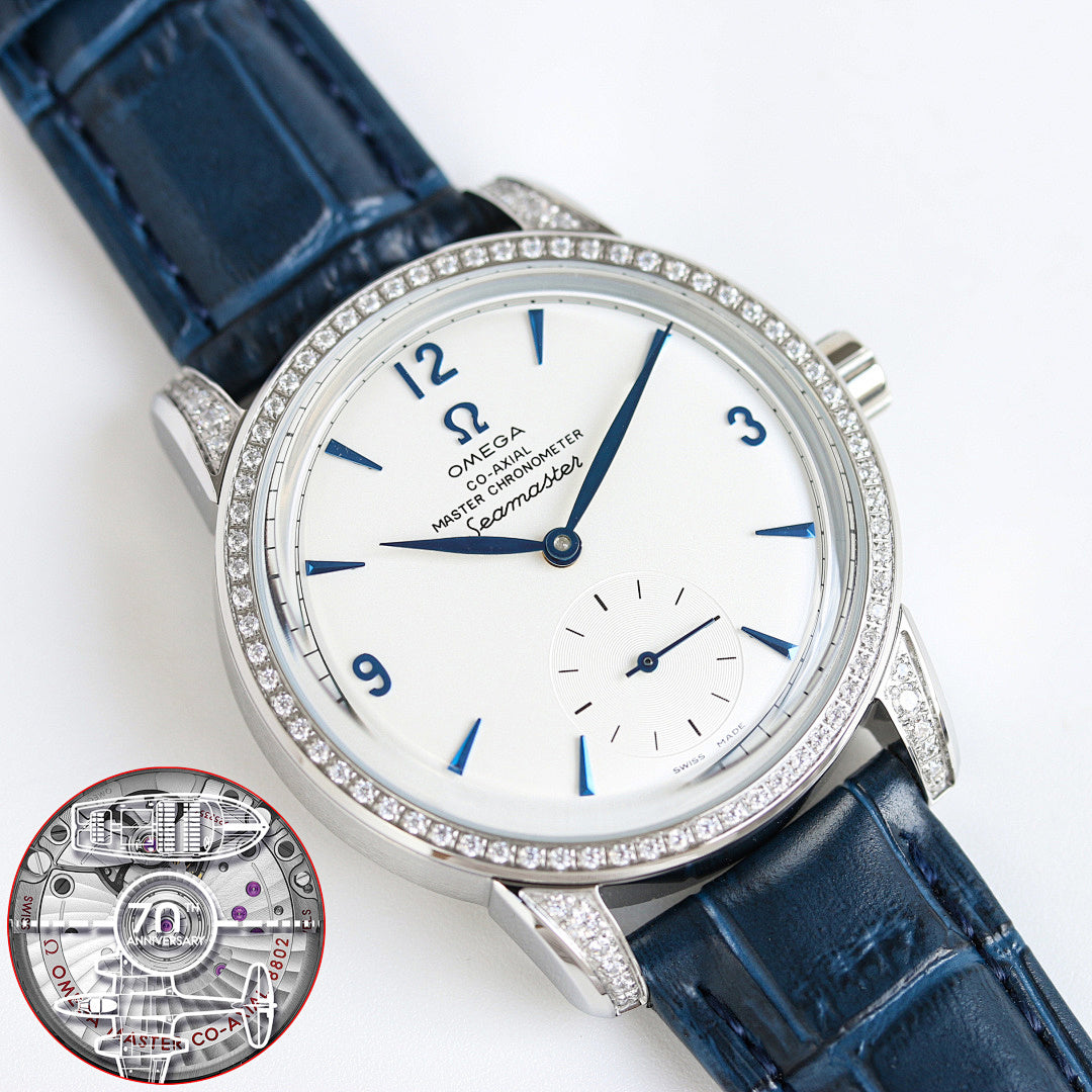 Silver-tone watch with blue leather strap, diamond bezel, white dial and blue hands.
