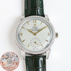 Silver watch with green leather strap, diamond bezel, white dial with gold markers.