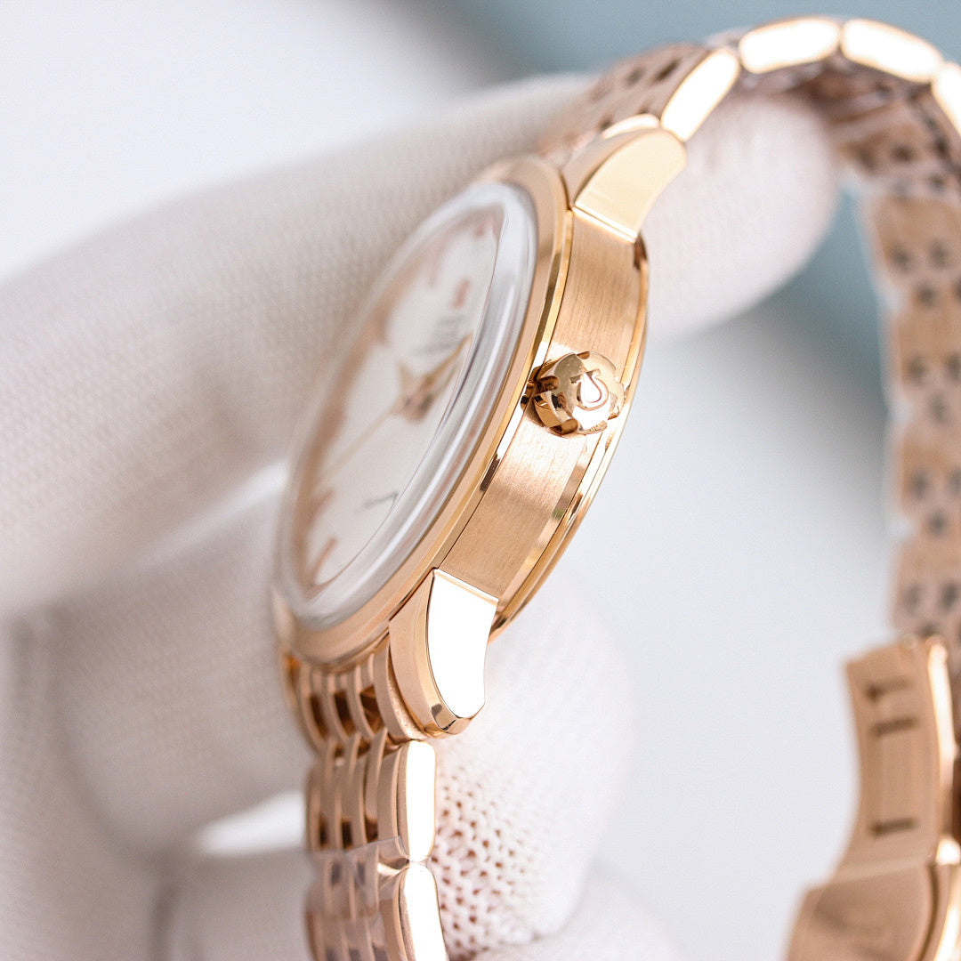 Omega Seamaster watch with rose-gold case and bracelet, side profile