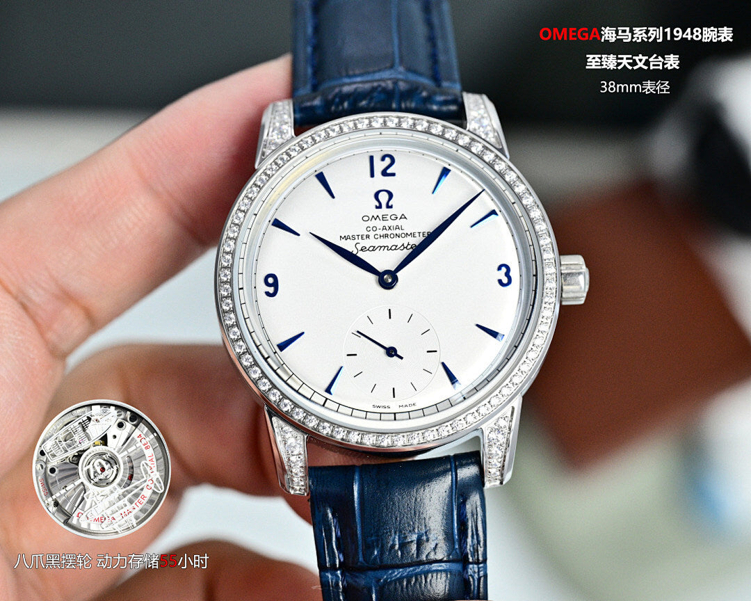 Omega Seamaster watch on blue leather strap, jeweled silver bezel, white dial