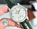 Omega Seamaster watch with green leather strap, jeweled silver bezel, white dial