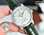 Omega Seamaster watch with green leather strap, jeweled silver bezel, white dial