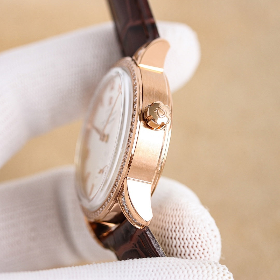 Rose-gold watch side profile with white dial and brown leather strap