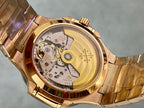 Patek Philippe watch case back with gold-toned movement visible