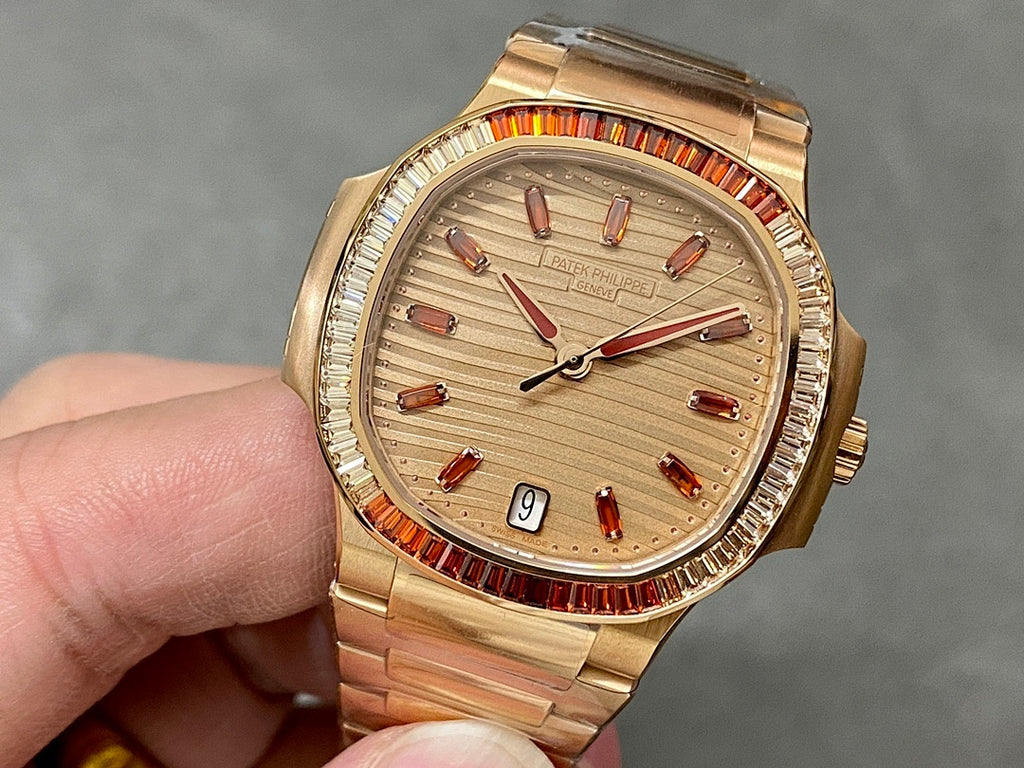 Patek Philippe wristwatch with gold-tone bracelet, cream dial, red seconds track