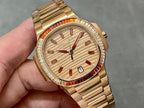 Patek Philippe wristwatch front view, cream dial with gold hands and red minute marks
