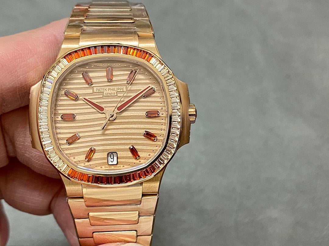 Patek Philippe wristwatch, cream dial and red track, gold-tone bracelet on hand