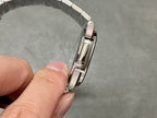 Wristwatch with bracelet side profile and clasp mechanism, polished metal links