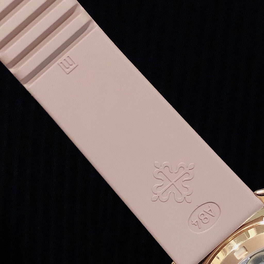 Patek Philippe watch pink strap with embossed logo on the inner side