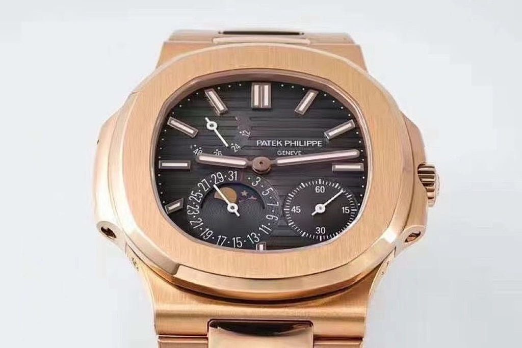 Patek Philippe rose-gold wristwatch with black dial, three subdials, metal case and crown
