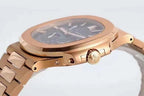 Patek Philippe rose-gold wristwatch side view with crown and integrated metal bracelet links