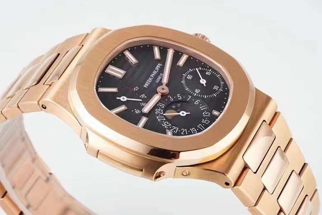 Patek Philippe rose-gold wristwatch front-left angle with black dial and subdials
