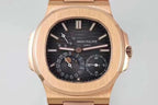 Patek Philippe rose-gold wristwatch close-up with black dial, subdials, and crown