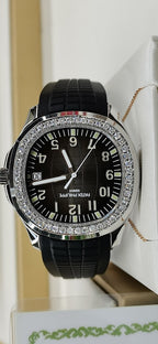 Patek Philippe wristwatch front view with black dial and diamond bezel