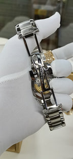 Luxury watch wristwatch with silver metal bracelet and deployant clasp
